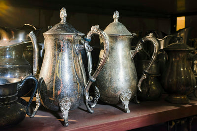 Silver vessels darkened by tarnish