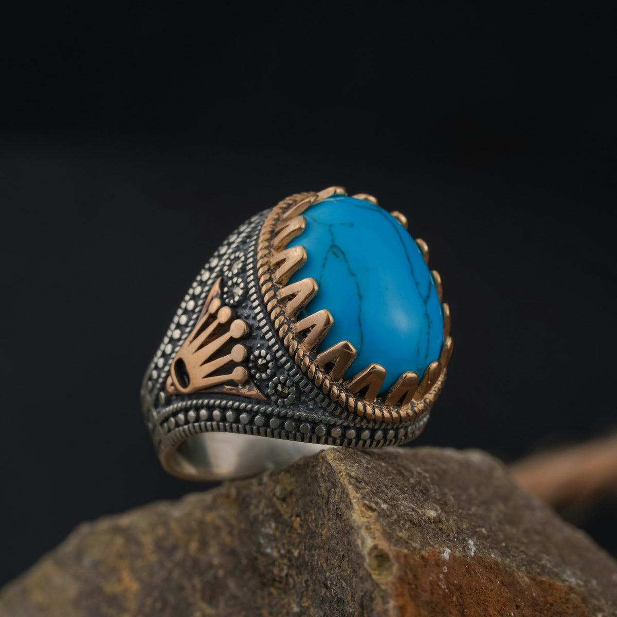 A silver ring set with a bright blue turquoise stone